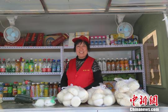 “小车子”也能助推“大扶贫”。　陈艳迪 摄