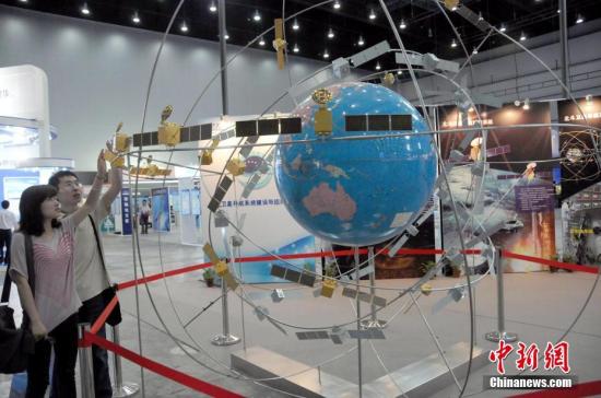 资料图:北斗卫星导航系统组网模型示意图。中新社记者 孙自法 摄 资料图:北斗卫星导航系统组网模型示意图。/p中新社记者 孙自法 摄