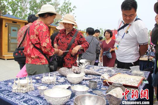 图为推介活动现场。　冷桂玉 摄